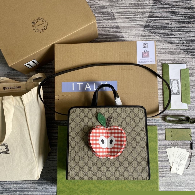 G*u*i shopping bags